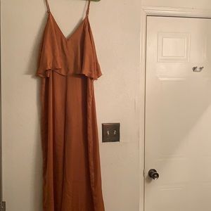 Burnt orange jumpsuit with riffle top.